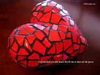 red glass heart made of cracked pieces of broken glass representing a shattered heart, my forever son